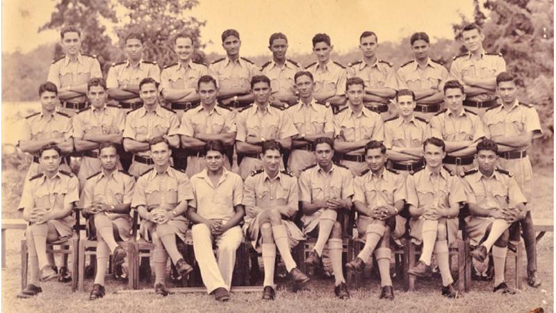 The police officers of the Muthur Police Station, 1948. Abdul Rahman Abdeen as a Sub Inspector of Muthur police.  (fourth from left on top) 