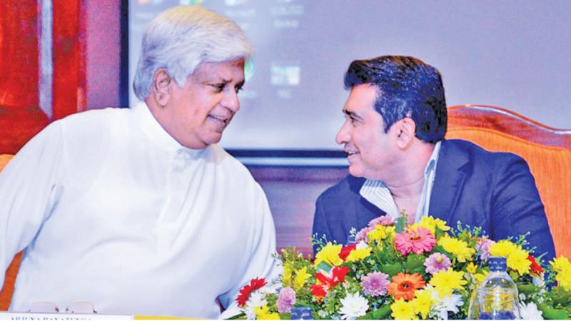 The two most powerful and influential people in Sri Lanka sports. Ex-champion cricket captain Arjuna  Ranatunga (left) and Sports Minister Roshan Ranasinghe come together at a public function