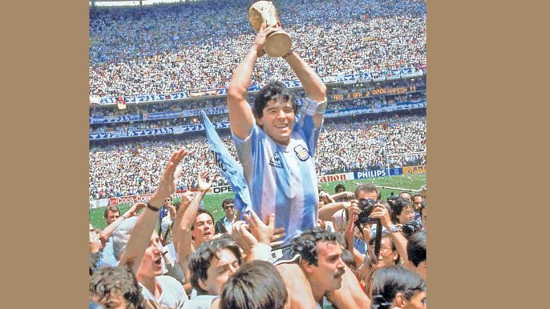 Maradona in a lifetime celebratory mood after bagging the top prize in football for Argentina in 1986