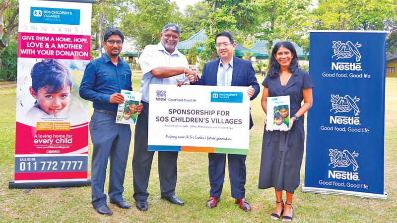 Nestle and SOS Children’s Village officials after signing the MoU