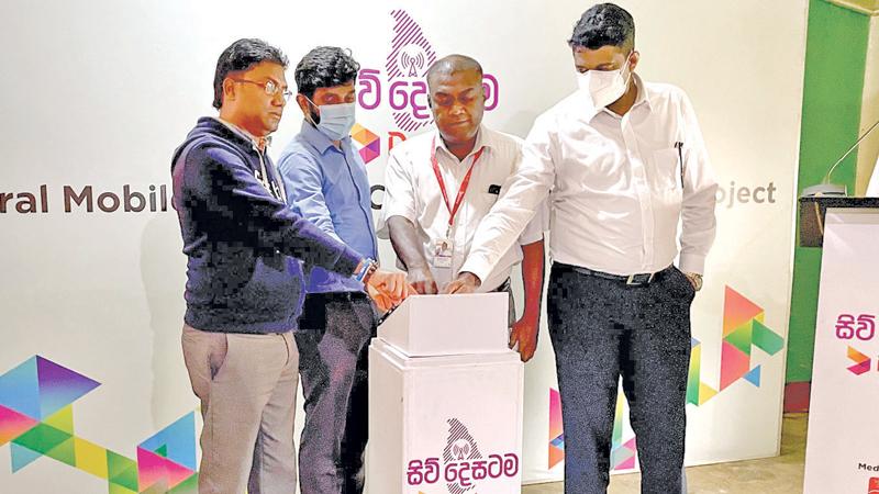 Commissioning of the tower: (From left) Vice President, Ceylon Estate Staff Union, Sennan Elayaraja, Engineer, Central Region, Dialog Network Services, Preshan Jayarathne, District Manager, Nuwara Eliya, Regional Operations, Kumeresh Balakrishnan, Territory in Charge, Nuwara Eliya, Regional Operations, Ravindra Ariyarathna.