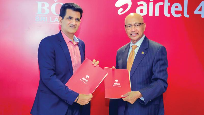 Airtel Lanka, CEO Ashish Chandra with BOI Chairman, Raja Edirisuriya