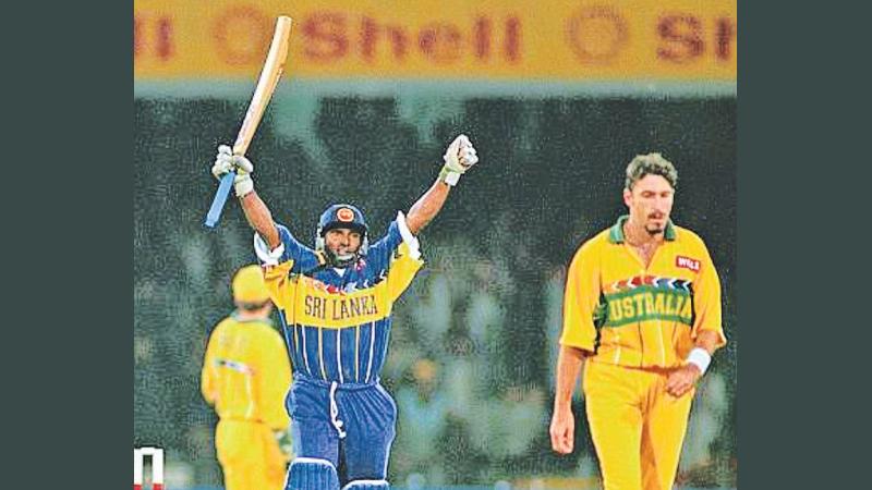 Aravinda de Silva signals his match-winning century in the 1996 World Cup final against Australia