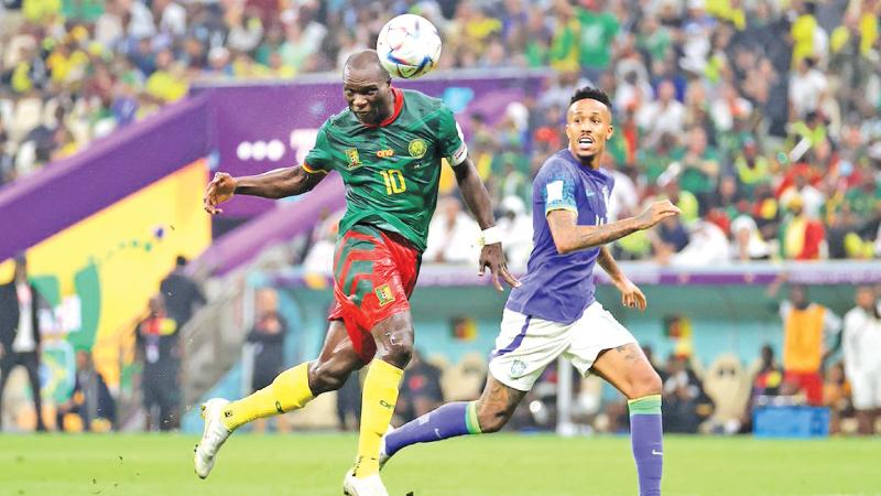 Cameroon’s Vincent Aboubakar heads the winning goal