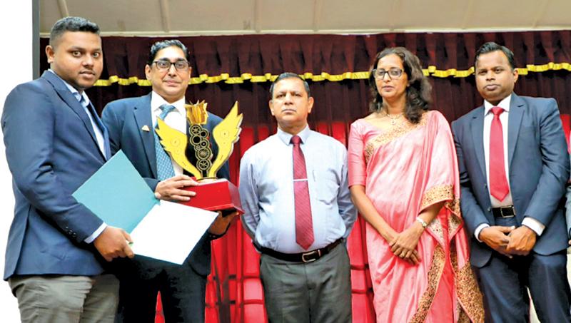 Utech Managing Director Riyad Ismail with the award