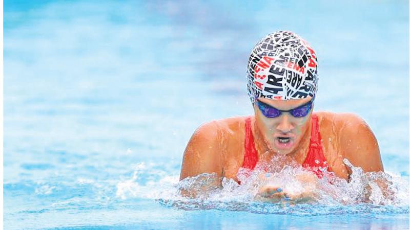 Anjali Agalawatta of St. Bridget’s Convent doing the breast stroke event in the girls U-20