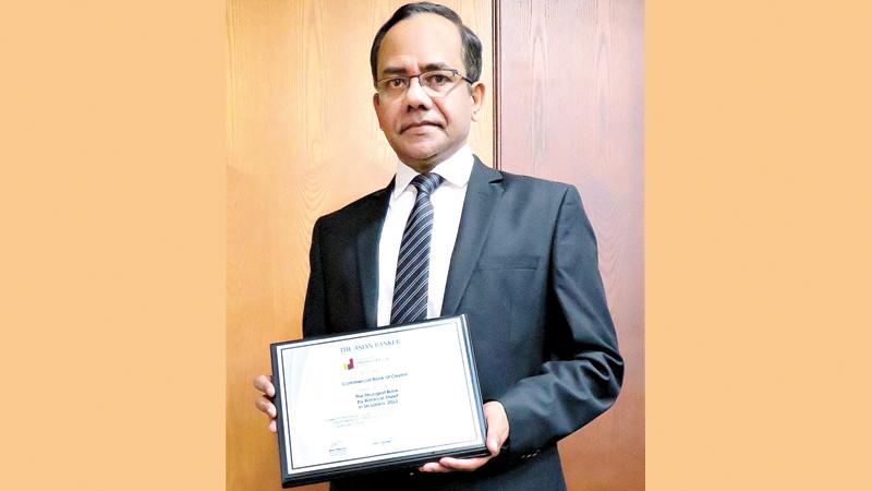 Commercial Bank COO, S. Prabagar with the award