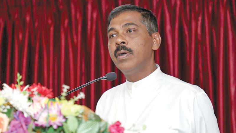 State Minister Prasanna Ranaweeera addresses the event