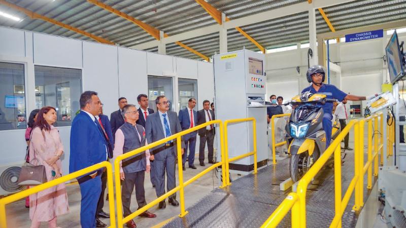 From left: First Secretary, Commerce and Culture, Indian High Commission, Ms. Irina Thakur, COO, New Vehicle Sales and Operations, TVS Lanka, Geethal Anthony, Indian High Commissioner Gopal Baglay and Vice President, TVS & Sons, P. K. Kannan, India, at the new TVS factory in Horana.