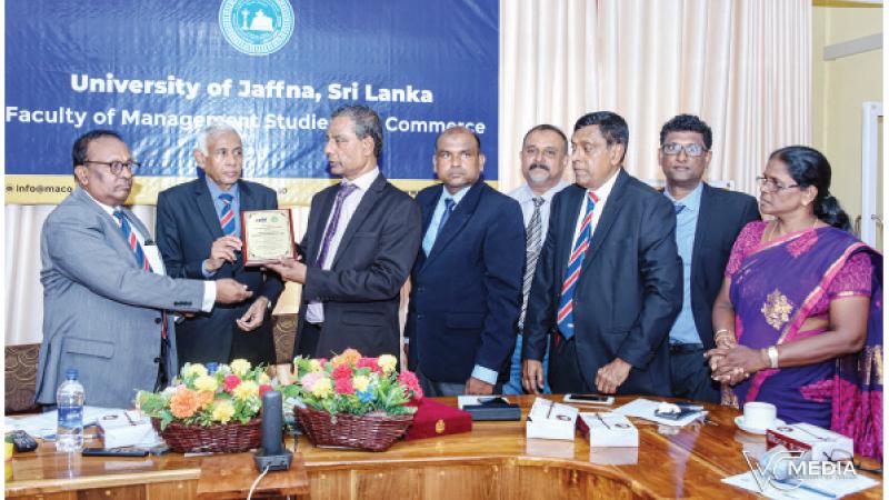 Treasurer, Col. Saman Jayawickrama, CEO U. A. C. Obesekere, and Director of Professional and Academic Affairs, CIPM, G. Weerathunga exchange the MoU.