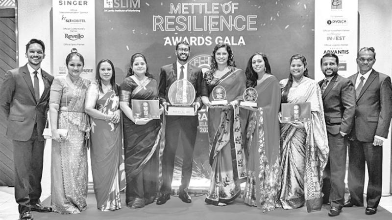 The Ceylinco Life team with the awards