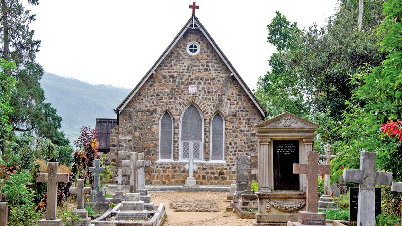 The front view of the stone built Christ Church Warleigh amid surrounding tombstones