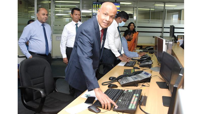 The first INR transaction with India yesterday was executed by General Manager K. E. D. Sumanasiri, DGM, International, Treasury and Investment, R. M. N. Jeewantha and AGM, Treasury, A. W. R. Thushantha on Friday.