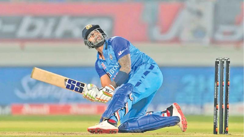 Suryakumar Yadav scoops a ball to the boundary during his unbeaten 112 that sank Sri Lanka