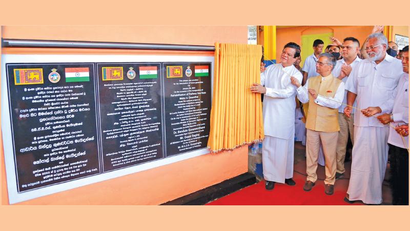Minister of Transport and Highways and Media Dr. Bandula Gunawardena and Indian High Commisioner to Sri Lanka Gopal Baglay unveils commemorative plaque for the project with Fisheries Ministry Douglas Devananda and State Minister Shehan Semasinghe
