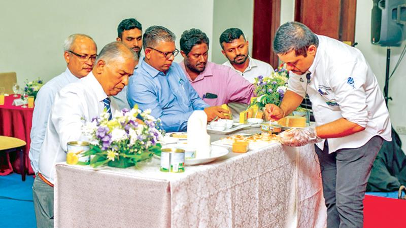Pelwatte Dairy Chairman Ariyaseela Wickramanayake and officials at the launch.