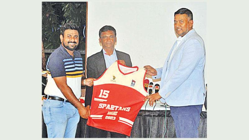 Gaja Sports CEO Gayath Jayasinghe and Gaja Sports Vice President Sahan Randima (left) handing over the sponsorship jersey to MBSL secretary Basil Silva (Pic by Sudath Malaweera)