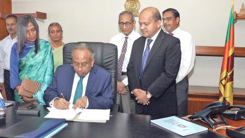 Chairman Ronald Perera assuming duties. picture by Nissanka Wijeratne