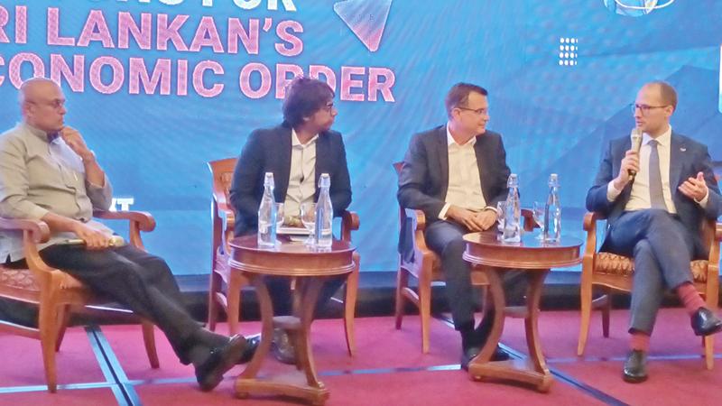 Head of State-Owned Enterprise Restructuring Suresh Shah, Policy Advisor Economics and Finance (FNF), Justus Lenz, moderator Shamindra Kulamannage and Joint Managing Director of JAAR Corporate Solutions (Germany), Andreas Hergenrother at the event. Pic: Claude Gunasekera