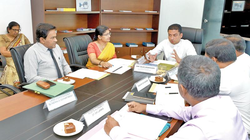 State Minister Dilum Amunugama and officials at the Investor Facilitation Coordinating Committee Meeting