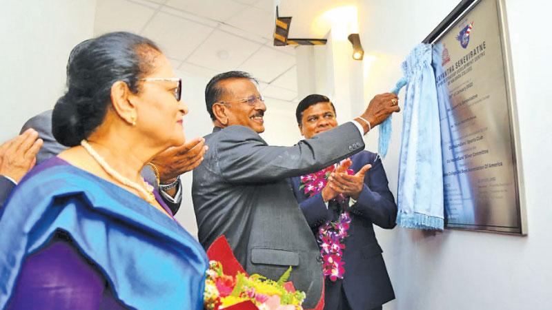 Former Sri Lanka cricketer Jayantha Seneviratne (centre) commissions the Jayantha Seneviratne Sports Strategy Development Centre of Nalanda College flanked by his wife Kumari and the school principal Thilak Waththuhewa (Pic by Chinthaka Kumarasinghe)