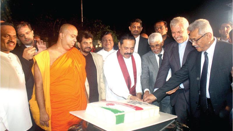 Chief Guest Naseer Ahamed along with the Ambassador Hashem Ashjaazdseh and former Presidents Mahinda Rajapaksa and Gotabaya Rajapaksa cutting the anniversary cake.