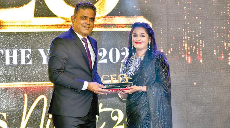 Kamal Munasinghe receives the award from publisher of the CEO Magazine, Shobiya Clinton. Pic: CEO Media