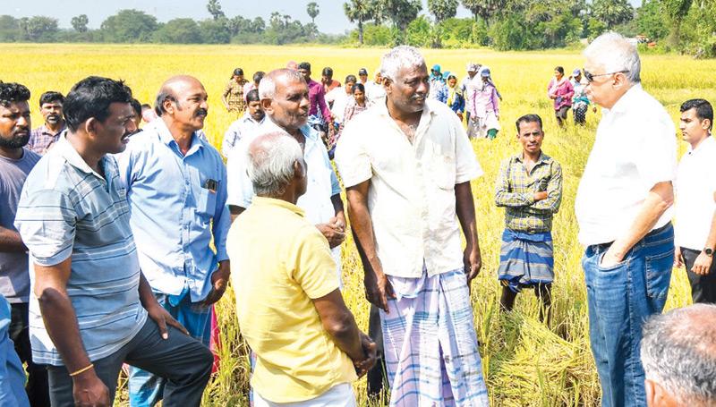 President Ranil Wickremesinghe engaging in conversation with the farmer community in the Paranthan area in Jaffna on Saturday.
