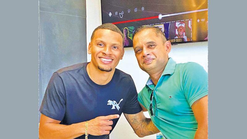 Nalaka Hewamadduma with Olympic champion Andre de Grasse of Canada