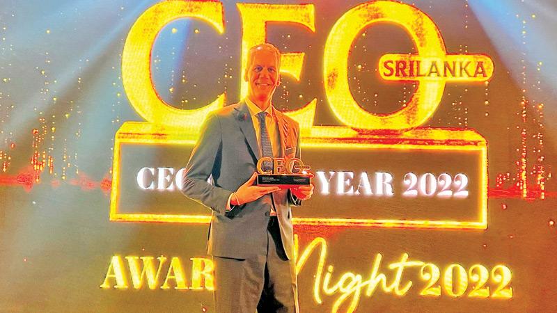 Managing Director and CEO of A. Baur & Co Rolf Blaser with the award