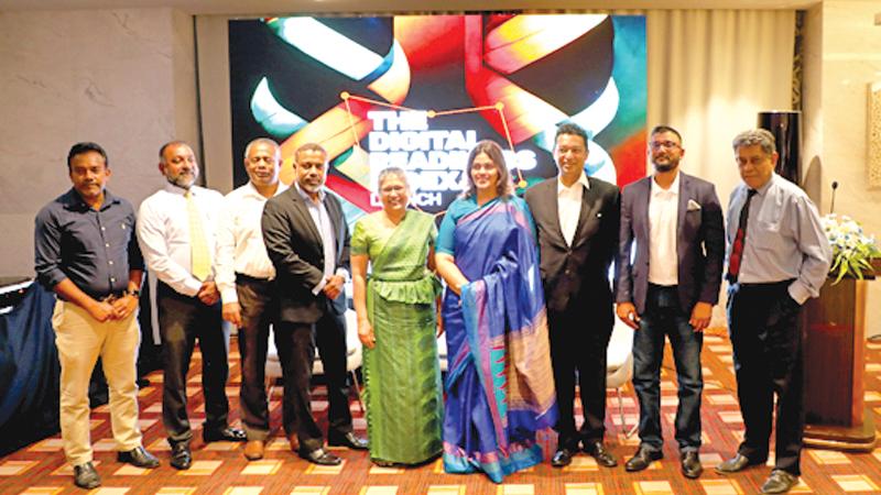 After signing the MoU. Prof. B. Wanninayake, B. Emmanuel, N. Fernando, A. Medis, Snr. Prof. N. De Silva, N. A. Cader, M. Ishaq, A. Irfan, and H. Hewavisenti.