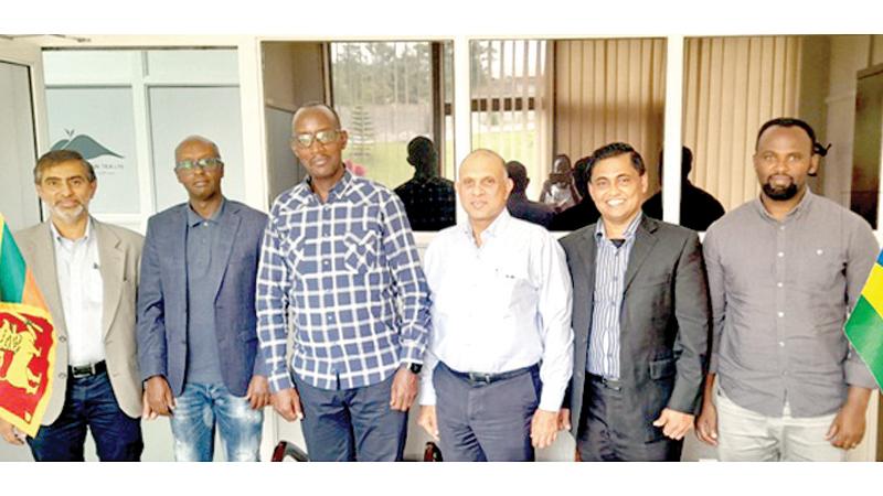 After signing the agreement. From left : CEO, Vidullanka, Riyaz Sangani, CEO, RMT, Alain Kabeja, COO, RMT, Jonathan Bisengimana, Strategic Advisor, RMT, Manoj Pathiraja, Director, Operations, Vidullanka, Roshan Siriwadana and Technical Director, RMT, Jerome Museminari.