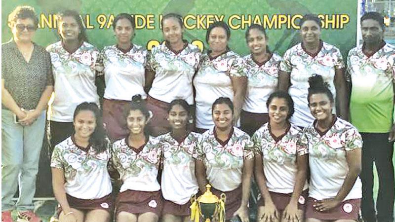 Standing from left: Fazlin, Thasuni Malwanna (GK), Thanuja Sandamali, Lashika Dewmini, Nadeera Jayangani (captain), Niroshika Sajeevani, Dulmini Irangika and R. Pathmeshwaran (Nathan). Kneeling from left: Amasha Saraph, Chamodi Gunewardena, Naduni Malwanna, MHA Udayangani (Chandiy), Laura Edwards and Shalonica Jeevanantham.