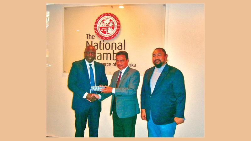 National Chamber President Deepal Nelson greets Kenya’s High Commissioner, Willy Bett. Senior Deputy President Anura Warnakulasooriya looks on.