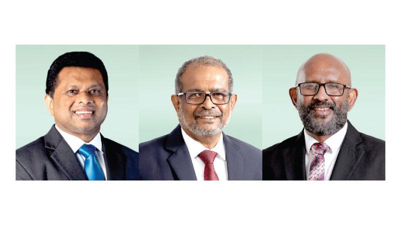 Chairman Jayantha S B Rangamuwa, CEO Nimal Tillekeratne and CEO Designate Naleen Edirisinghe