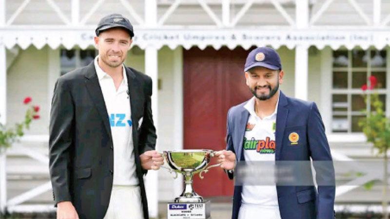 Sri Lanka skipper Dimuth Karunaratne and New Zealand skipper Tim Southee poses the picture with test champion trophy at Christchurch. ( Pic courtesy Getty Images- Sanka Vidhanagama) 