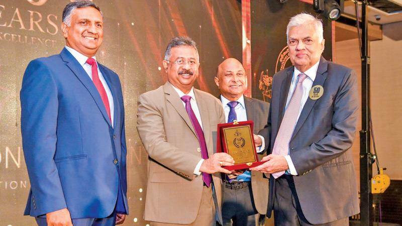 President Ranil Wickremesinghe who has completed 50 years at the Bar was honoured and presented with a plaque by Chief Justice Jayantha Jayasuriya PC on Sunday. 