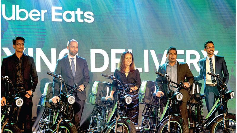 Minister of Power and Energy Minister Kanchana Wijesekera, US ambassador to Sri Lanka, Julie J. Cheng along with Senior Director, Public Policy and Government Relations, Asia Pacific Region at Uber Mike Orgill and Interim General Manager, Uber Eats Sri Lanka, Pivithuru Kodikara at the launch of e-cycles event in Colombo