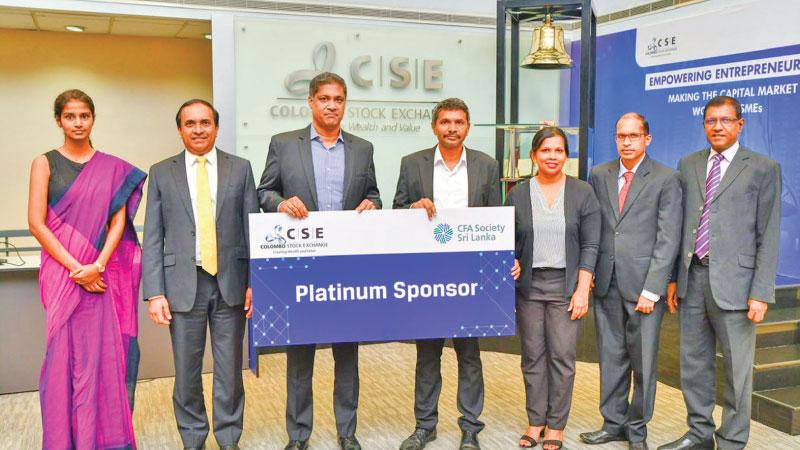 From left: CSE Legal Officer Ms Uthpala Dissanayake, CEO Rajeeva Bandaranaike, Chairman Dilshan Wirasekara, President of CFA Society Aruna Perera, Vice President of CFA Society Ms. Rashmi Paranavitane, Director, CFA Society  Travis Gomes, CEO, CFA Aruna Alwis at the presentation of the sponsorship package.