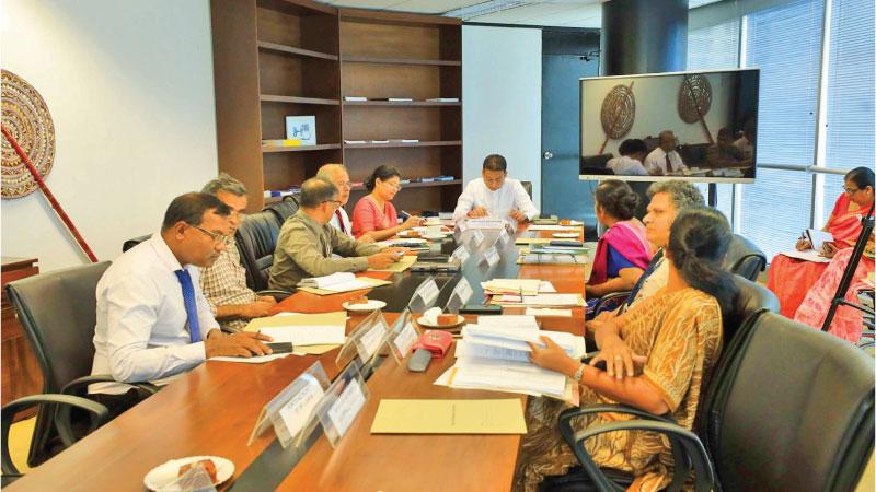 State Minister Dilum Amunugama, BOI officials and investors at the meeting