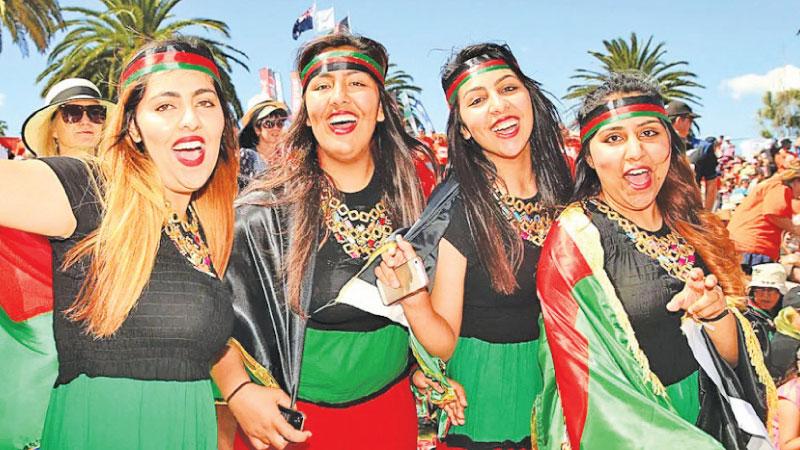 Afghanistan women cheer their team in this file photo