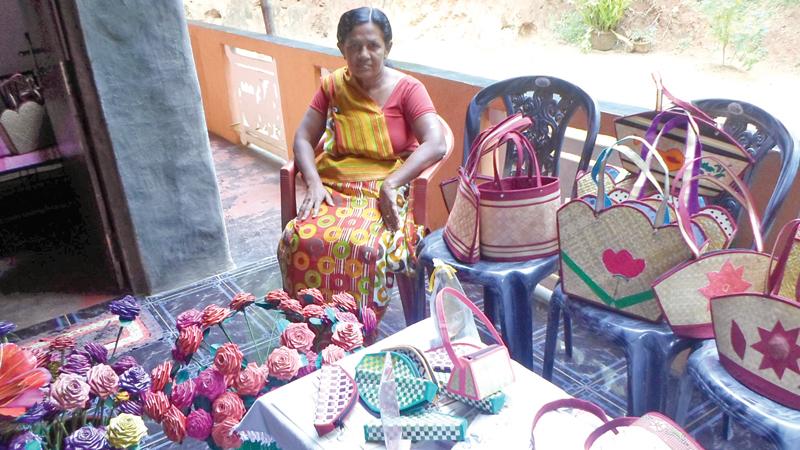  A handicraft worker with her products