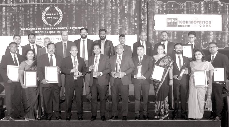 Bank of Ceylon General Manager and CEO Russel Fonseka, members of the  Corporate and Executive Management with the awards 