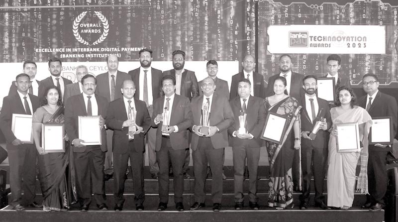 Bank of Ceylon General Manager and CEO Russel Fonseka, members of the Corporate and Executive Management with the awards