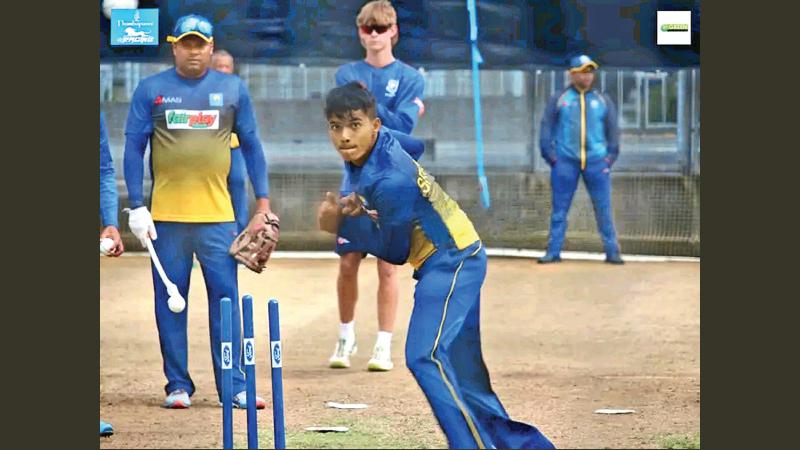 Sri Lanka White ball spinner Dunith Wellalage taking part in the training session with Assistant Batting Specialist Coach Thilina Kandamby. (Pix courtesy Sportspavilion. lk)