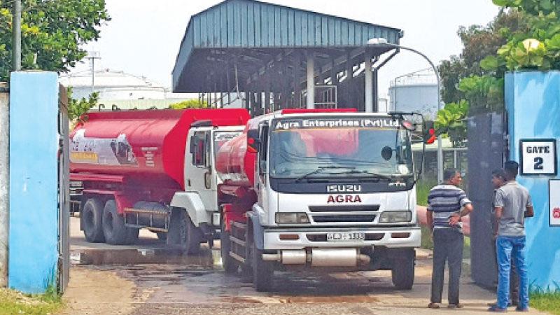 Fuel bowsers leaving the Muthurajawela terminal. (Picture by Prasanga Perera,Ja-ela group corr)