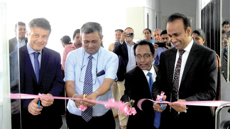 Minister of Plantations Ramesh Pathirana and officials at the opening