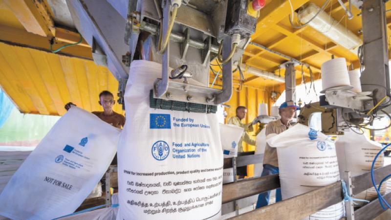 The Urea fertilizer being packed for distribution to 72,200 smallholder farmers and paddy seed farmers across Sri Lanka.