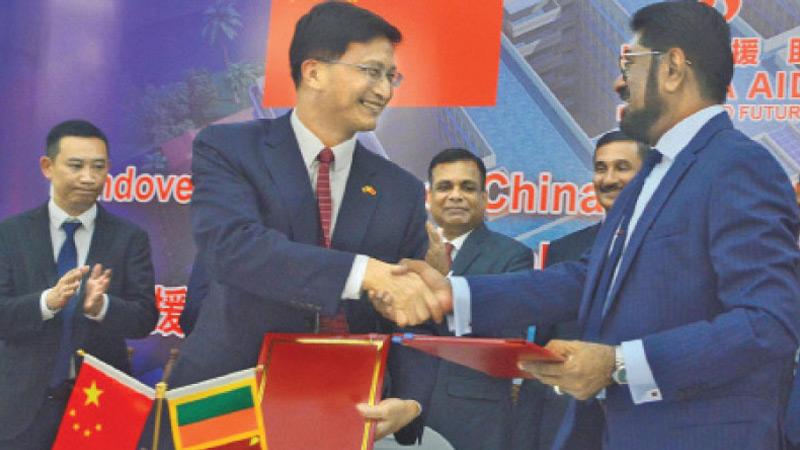 Chinese Ambassador in Sri Lanka Qi Zhenghong and Health Minister Dr. Keheliya Rambukwella at the opening. Pictures by Sudath Nisantha.