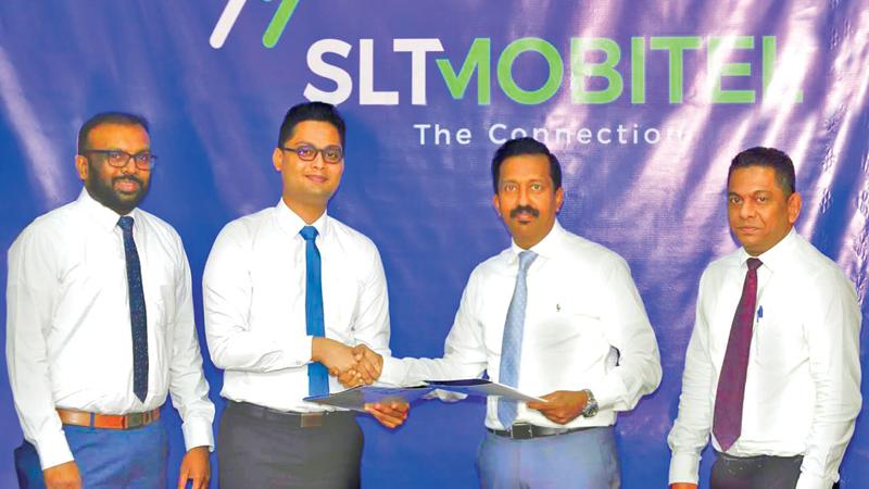 From left: Director, Stemup Foundation, Sameera Prajapriya and Chairman, Stemup Foundation, Prabhath Mannaperuma, exchange the agreement with SLT-Mobitel GCMO Prabhath Dahanayake and General Manager, Marketing Services, SLT, Anuruddha Suriarachchi